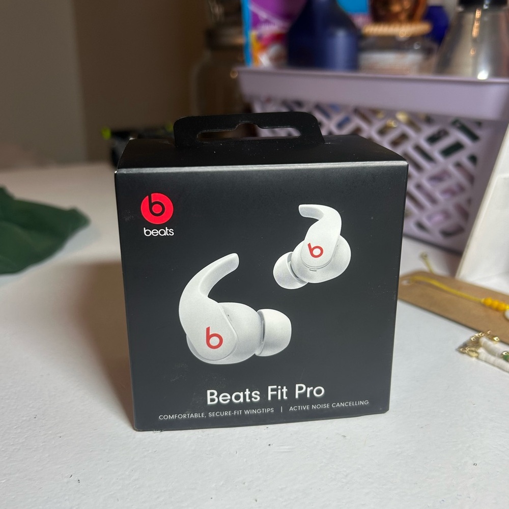 White Beats Fit Pro noise canceling earbuds (charger not included)